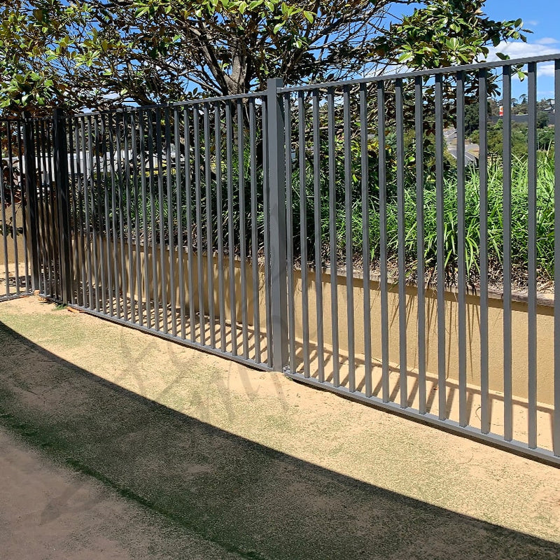 Steel security fencing and gates installed around a childcare and school perimeter