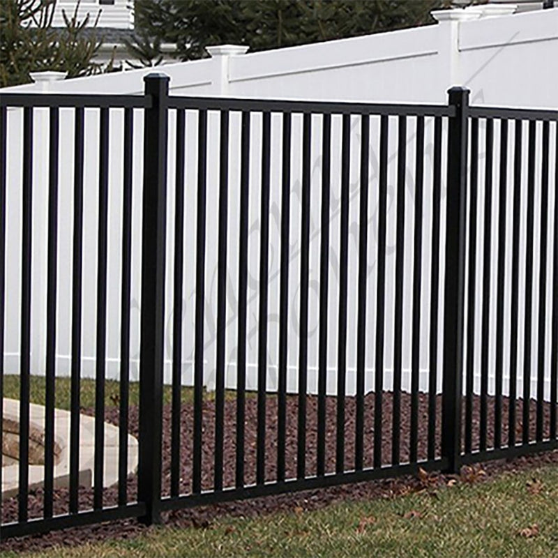 Black steel security fence panels installed along a property boundary